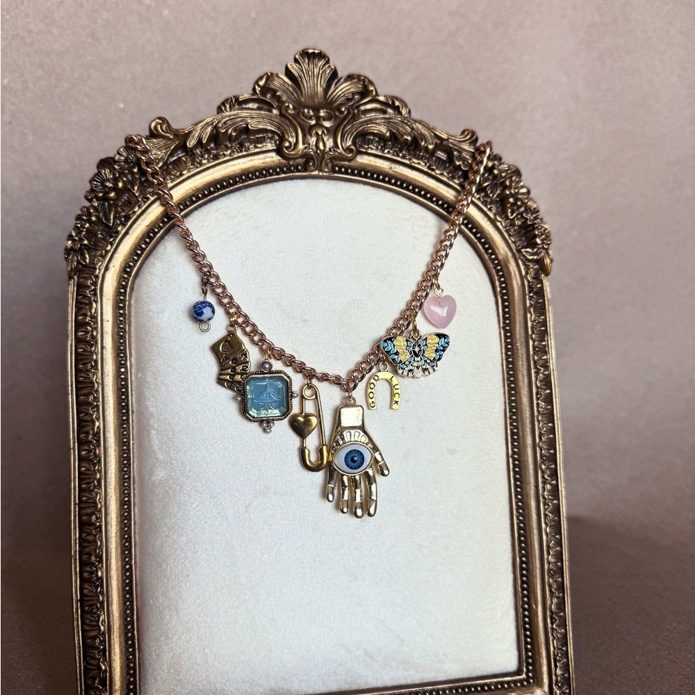 Elegant Gold Charm Necklace with Blue Accents